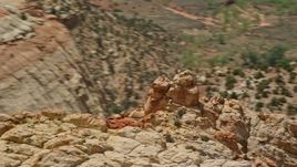 5.5K aerial stock footage of orbiting the Waterpocket Fold rock formations, steep canyon, Capitol Reef National Park, Utah Aerial Stock Footage | AX130_312