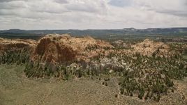 5.5K aerial stock footage of orbiting desert mountains, surrounded by vegetation, Dixie National Forest, Utah Aerial Stock Footage | AX130_342