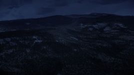4K day for night color corrected aerial footage of flying by low, green mountains, Dixie National Forest, Utah Aerial Stock Footage | AX130_350_DFN