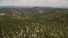 5.5K aerial stock footage of flying by mountains and valleys, Dixie National Forest, Utah Aerial Stock Footage | AX130_357