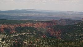 5.5K aerial stock footage of a wide view of mountains and canyons, Dixie National Forest, Utah Aerial Stock Footage | AX130_358