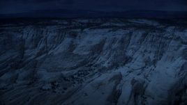 4K day for night color corrected aerial footage of approaching, flying over a canyon, Grand Staircase-Escalante National Monument, Utah Aerial Stock Footage | AX130_384_DFN