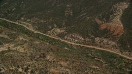 5.5K aerial stock footage pan across Hells Backbone Road, Grand Staircase-Escalante National Monument, Utah Aerial Stock Footage | AX130_391E