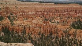 5.5K aerial stock footage of flying by hoodoos and buttes, Bryce Canyon National Park, Utah Aerial Stock Footage | AX130_432