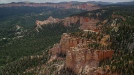 5.5K aerial stock footage of approaching and flying over buttes, forest, Bryce Canyon National Park, Utah Aerial Stock Footage | AX131_018E