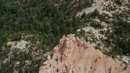 5.5K aerial stock footage of orbiting a butte, hoodoos, surrounded by trees, Bryce Canyon National Park, Utah Aerial Stock Footage | AX131_020