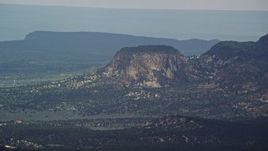 5.5K aerial stock footage of flying by large butte, Grand Staircase-Escalante National Monument, Utah Aerial Stock Footage | AX131_038