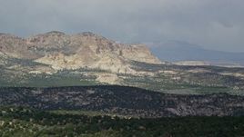 5.5K aerial stock footage of passing by rugged mountains, Grand Staircase-Escalante National Monument, Utah Aerial Stock Footage | AX131_069E