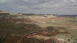 5.5K aerial stock footage descend and approach Highway 89, Glen Canyon National Recreation Area, Utah, Arizona Aerial Stock Footage | AX131_093E