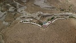 5.5K aerial stock footage flyby the Amangiri Resort, Glen Canyon National Recreation Area, Utah, Arizona Aerial Stock Footage | AX131_124