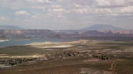 5.5K aerial stock footage flyby Wahweap and Lake Powell, seen from Glen Canyon National Recreation Area, Utah, Arizona Aerial Stock Footage | AX131_126