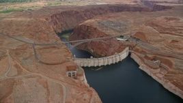 5.5K aerial stock footage of orbiting the Glen Canyon Dam and Bridge, Arizona Aerial Stock Footage | AX131_135E