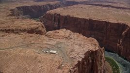 5.5K aerial stock footage of flying toward and panning across the Colorado River and Glen Canyon, Arizona Aerial Stock Footage | AX131_157E