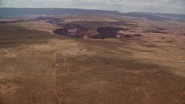 5.5K aerial stock footage approach and tilt to bird's eye view of Horseshoe Bend and Colorado River, Glen Canyon, Arizona Aerial Stock Footage | AX131_163E