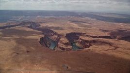 5.5K aerial stock footage of a wide view of Horseshoe Bend and the Colorado River, Glen Canyon, Arizona Aerial Stock Footage | AX131_171