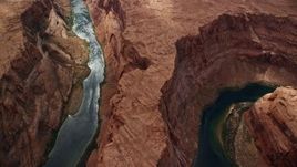 5.5K aerial stock footage of flying over Horseshoe Bend, looking down at Colorado River, Glen Canyon, Arizona Aerial Stock Footage | AX131_179