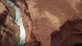 5.5K aerial stock footage of a bird's eye view of Colorado River at the bottom of Glen Canyon, Arizona Aerial Stock Footage | AX131_180