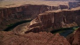 5.5K aerial stock footage of Horseshoe Bend, and Colorado River in the deep Glen Canyon, Arizona Aerial Stock Footage | AX131_218