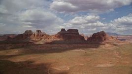 5.5K aerial stock footage of approaching large buttes in Navajo Nation Reservation, Arizona Aerial Stock Footage | AX132_001E