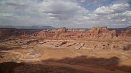 5.5K aerial stock footage of approaching row of buttes, Navajo Nation Reservation, Arizona Aerial Stock Footage | AX132_006E