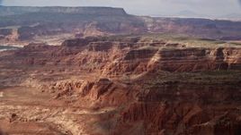 5.5K aerial stock footage of mesas across a canyon, Navajo Nation Reservation, Utah Aerial Stock Footage | AX132_023