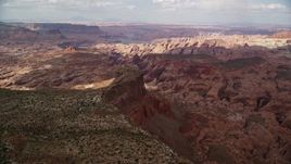 5.5K aerial stock footage of a wide view of rock formations in a canyon, Navajo Nation Reservation, Utah Aerial Stock Footage | AX132_026E