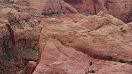 5.5K aerial stock footage flyby rock formation, reveal stone arch, Rainbow Bridge National Monument, Utah Aerial Stock Footage | AX132_043E