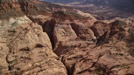 5.5K aerial stock footage of an approach to rock formations at Navajo Mountain, Utah Aerial Stock Footage | AX132_061E