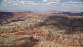 5.5K aerial stock footage of approaching narrow desert canyons, Navajo Nation Reservation, Arizona, Utah Aerial Stock Footage | AX132_088E