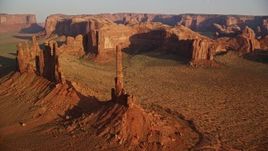 5.5K aerial stock footage orbit buttes in the desert, Monument Valley, Utah, Arizona, twilight Aerial Stock Footage | AX133_041E