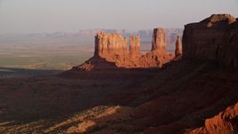 5.5K aerial stock footage of tall buttes in Monument Valley, Utah, Arizona, twilight Aerial Stock Footage | AX133_095E