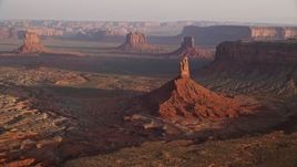 5.5K aerial stock footage approach and tilt to Big Indian Butte in Monument Valley, Utah, Arizona, twilight Aerial Stock Footage | AX133_133E