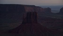 5.5K aerial stock footage of West Mitten Butte in Monument Valley, Utah, Arizona, twilight Aerial Stock Footage | AX134_061