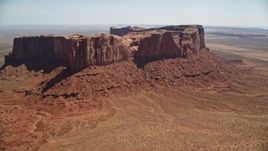 5.5K aerial stock footage of passing Meridian Butte in Monument Valley, Utah, Arizona Aerial Stock Footage | AX135_167