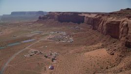 5.5K aerial stock footage of flying by Goulding's Lodge, near Oljeto Mesa and Monument Valley Airport, Utah Aerial Stock Footage | AX135_204