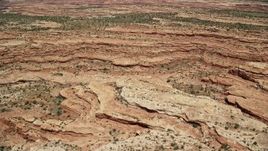 5.5K aerial stock footage of flying by narrow canyons and mesa cliffs, Cedar Mesa, Utah Aerial Stock Footage | AX136_063