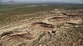5.5K aerial stock footage orbit a desert canyon and a mesa, Cedar Mesa, Utah Aerial Stock Footage | AX136_073E