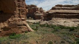 5.5K aerial stock footage of flying through the bottom of Grand Gulch, Grand Gulch Primitive Area, Utah Aerial Stock Footage | AX136_093E
