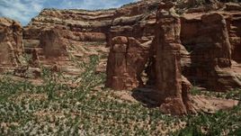 5.5K aerial stock footage of orbiting Angel Arch in Arch Canyon, Utah Aerial Stock Footage | AX136_157