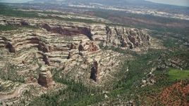 5.5K aerial stock footage pan right across canyon with rock formations and trees, Manti-La Sal National Forest, Utah Aerial Stock Footage | AX136_171