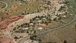5.5K aerial stock footage of orbiting rural homes by Residence Road, Canyonlands National Park, Utah Aerial Stock Footage | AX136_226