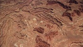 5.5K aerial stock footage of a bird's eye view of rugged canyons, buttes, Canyonlands National Park, Utah Aerial Stock Footage | AX136_248E