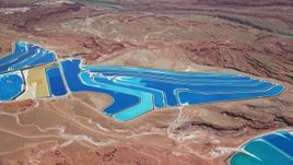 5.5K aerial stock footage of bird's eye view of potash ponds in a desert valley, Moab, Utah Aerial Stock Footage | AX136_271E