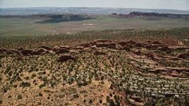 5.5K aerial stock footage of a view of rock fins in Devil's Garden, Arches National Park, Utah Aerial Stock Footage | AX137_017