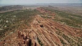 5.5K aerial stock footage of passing over rock fins and vegetation in Eagle Park, Arches National Park, Utah Aerial Stock Footage | AX137_026E