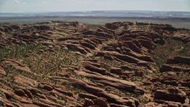 5.5K aerial stock footage of a view of Devil's Garden rock fins at Arches National Park, Utah Aerial Stock Footage | AX137_051