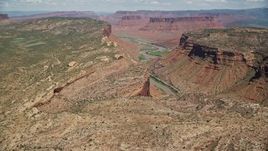 5.5K aerial stock footage of Colorado River and Parriott Mesa from canyon and Dry Mesa, Moab, Utah Aerial Stock Footage | AX137_078E