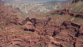 5.5K aerial stock footage of desert rock formations at Fisher Towers, Utah Aerial Stock Footage | AX137_100
