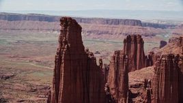 5.5K aerial stock footage of circling The Titan and nearby rock formations at Fisher Towers, Utah Aerial Stock Footage | AX137_114