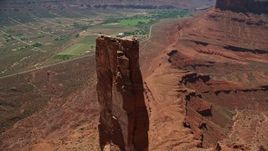 5.5K aerial stock footage of rock climbers on Castleton Tower in Moab, Utah Aerial Stock Footage | AX137_140
